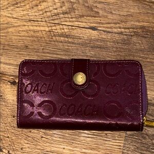 Coach purple Wallet with Embossed Design